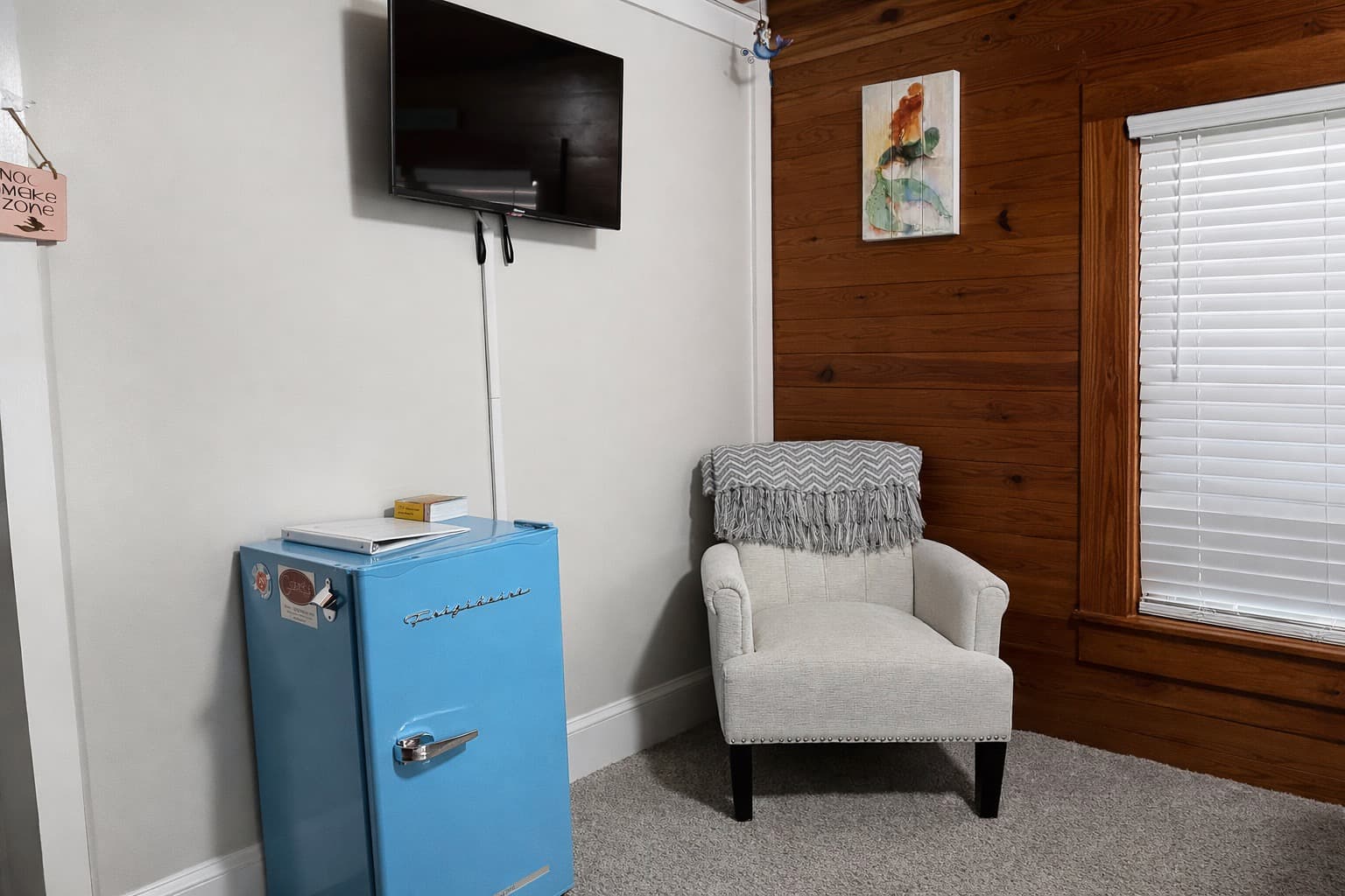 Mini fridge, TV, and Chair